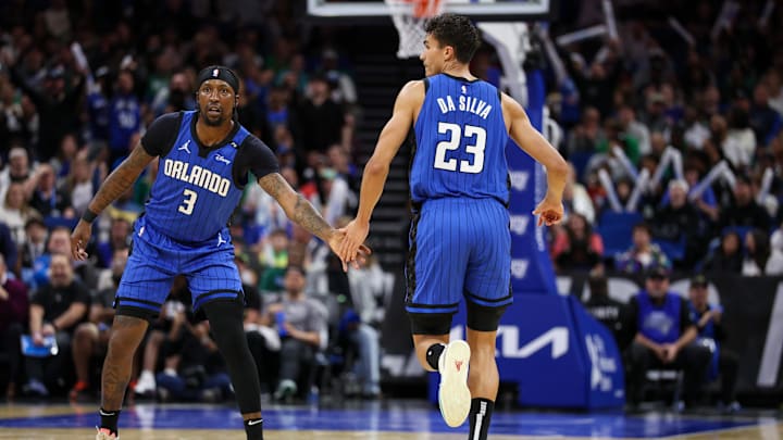 Orlando Magic guard Kentavious Caldwell-Pope (3) and forward Tristan da Silva (23) celebrate after a basket against the Boston Celtics in the third quarter at Kia Center.