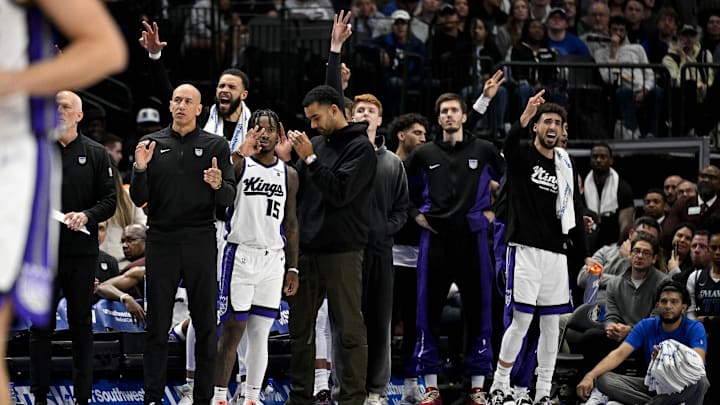 Nov 19, 2023; Dallas, Texas, USA; The Sacramento Kings bench celebrates after guard Malik Monk (not pictured) makes a three point basket against the Dallas Mavericks during the second half at the American Airlines Center. Mandatory Credit: Jerome Miron-Imagn Images