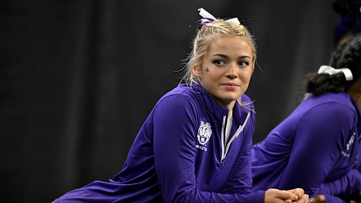 Apr 20, 2024; LSU Tigers gymnast Livvy Dunne watches as her team warms up on vault before the start of the 2024 Women's National Championship
