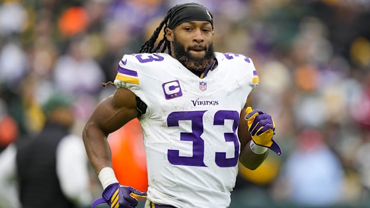 Nov 23, 2025; Green Bay, Wisconsin, USA;  Minnesota Vikings running back Aaron Jones Sr. (33) during the game against the Green Bay Packers at Lambeau Field.