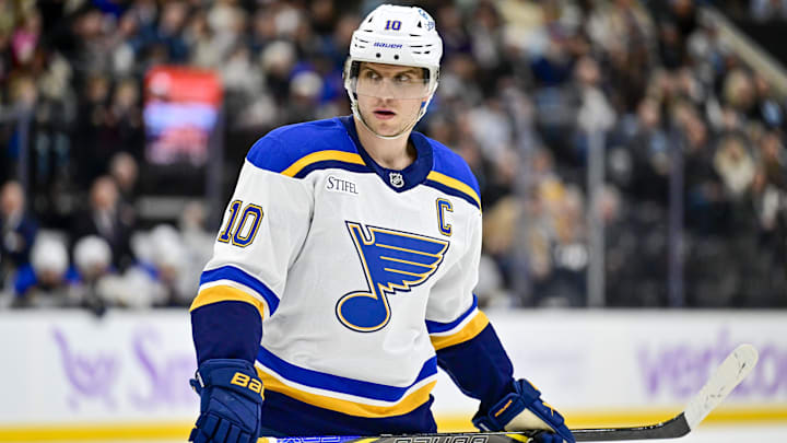 Jan 18, 2025; Salt Lake City, Utah, USA; St. Louis Blues center Brayden Schenn (10) before a face-off against the Utah Hockey Club during first period at the Delta Center. Mandatory Credit: Christopher Creveling-Imagn Images