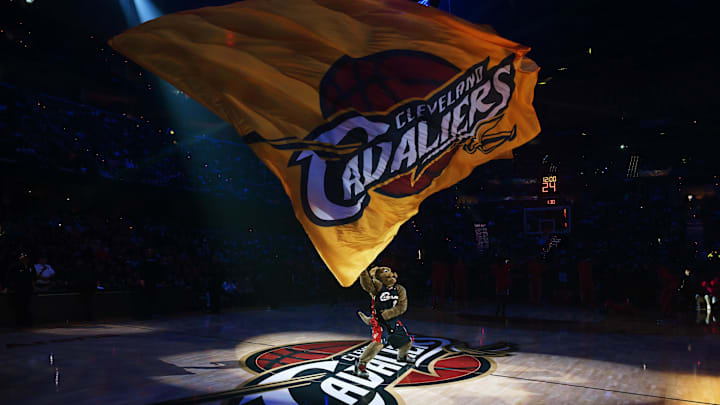 Nov 8, 2025; Cleveland, Ohio, USA; Moondog riles up the crowd and waves a flag before the game between the Cleveland Cavaliers and the Chicago Bulls during the first quarter at Rocket Arena. Mandatory Credit: Ken Blaze-Imagn Images