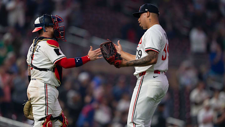 Jun 11, 2025; Minneapolis, Minnesota, USA; Minnesota Twins catcher Christian Vazquez (8) and relief pitcher Jhoan Duran (59) celebrate after defeating the Texas Rangers at Target Field. Mandatory Credit: Jordan Johnson-Imagn Images
