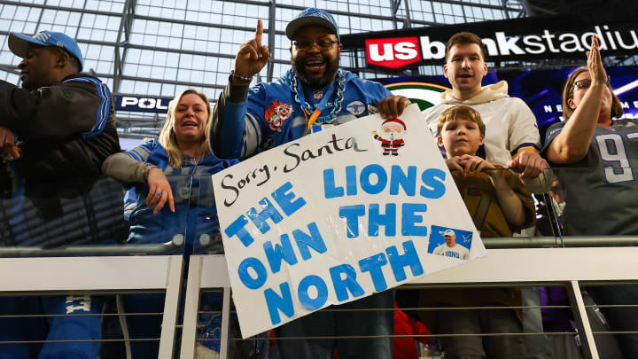 Dec 24, 2023; Minneapolis, Minnesota, USA; Detroit Lions fans celebrate the win against the Minnesota Vikings after the game at U.S. Bank Stadium. With the win, the Lions clinched the NFC North. Mandatory Credit: Matt Krohn-USA TODAY Sports Dec 24, 2023; Minneapolis, Minnesota, USA; Detroit Lions fans celebrate the win against the Minnesota Vikings after the game at U.S. Bank Stadium. With the win, the Lions clinched the NFC North. Mandatory Credit: Matt Krohn-USA TODAY Sports