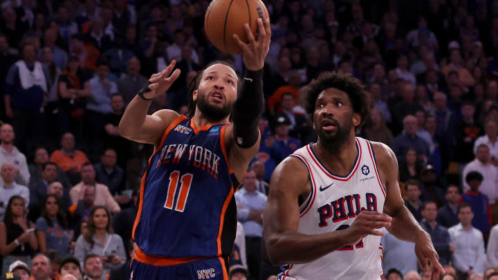 Apr 30, 2024; New York, New York, USA; New York Knicks guard Jalen Brunson (11) drives to the basket against Philadelphia 76ers center Joel Embiid (21) during overtime in game 5 of the first round of the 2024 NBA playoffs at Madison Square Garden. Mandatory Credit: Brad Penner-USA TODAY Sports