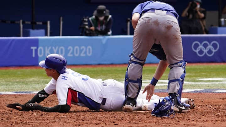 South Korea infielder Hyeseong Kim (bottom) scores a run against Israel during the 2020 Tokyo Olympics on July 29, 2021, at Yokohama Stadium. South Korea infielder Hyeseong Kim (bottom) scores a run against Israel during the 2020 Tokyo Olympics on July 29, 2021, at Yokohama Stadium.