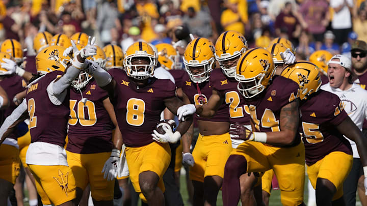 Arizona State linebacker Jordan Crook (8) celebrates an interception against BYU during Big 12 conference play at Mountain America Stadium on Nov. 23, 2024. Arizona State linebacker Jordan Crook (8) celebrates an interception against BYU during Big 12 conference play at Mountain America Stadium on Nov. 23, 2024.