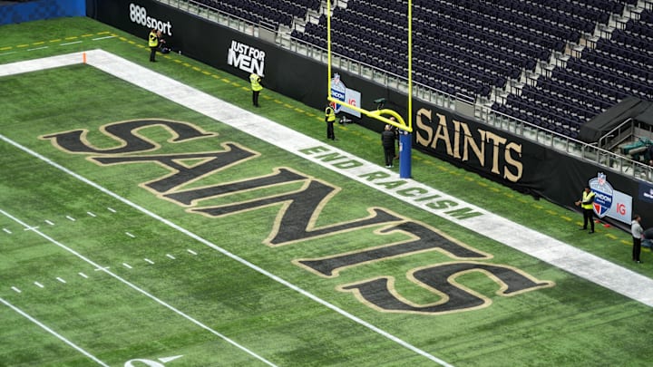 Oct 2, 2022; London, United Kingdom; The words \"End Racism\" and the New Orleans Saints logo in the end zone before an NFL International Series game at Tottenham Hotspur Stadium. Mandatory Credit: Kirby Lee-Imagn Images Oct 2, 2022; London, United Kingdom; The words \"End Racism\" and the New Orleans Saints logo in the end zone before an NFL International Series game at Tottenham Hotspur Stadium. Mandatory Credit: Kirby Lee-Imagn Images