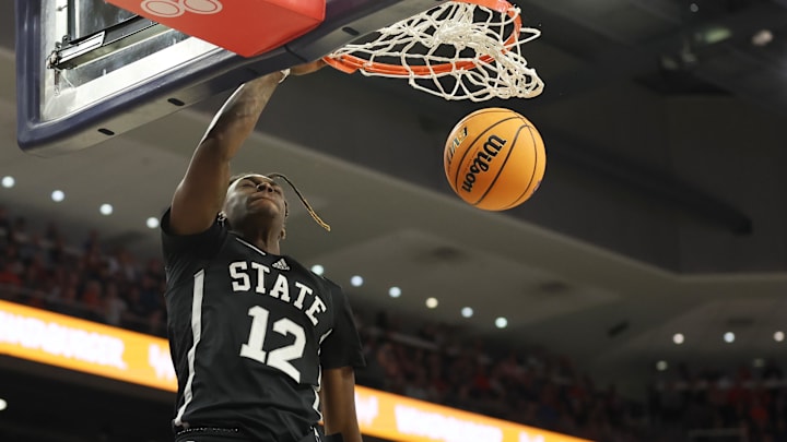 Mar 2, 2024; Auburn, Alabama, USA; Mississippi State Bulldogs forward KeShawn Murphy (12) makes a dunk against the Auburn Tigers during the first half at Neville Arena. Mandatory Credit: John Reed-Imagn Images