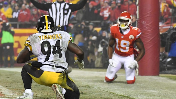 Jan 15, 2017; Kansas City, MO, USA; Pittsburgh Steelers inside linebacker Lawrence Timmons (94) gets up after defending Kansas City Chiefs wide receiver Jeremy Maclin (19) on a two-point conversion attempt during the fourth quarter in the AFC Divisional playoff game at Arrowhead Stadium. Mandatory Credit: Kirby Lee-Imagn Images