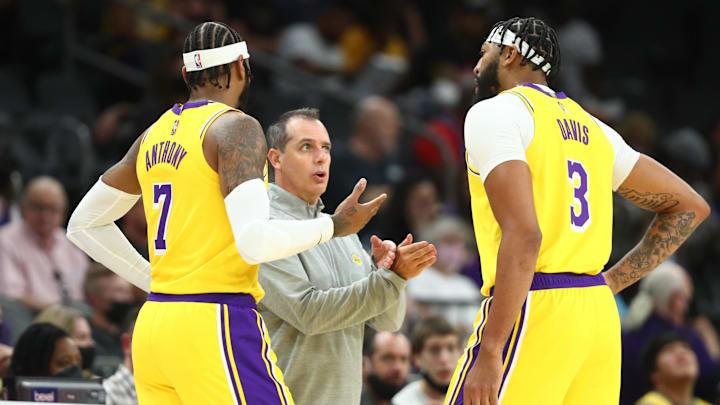 Oct 6, 2021; Phoenix, Arizona, USA: Los Angeles Lakers forward Carmelo Anthony (7) and forward Anthony Davis (3) with head coach Frank Vogel against the Phoenix Suns during a preseason game at Footprint Center. Mandatory Credit: Mark J. Rebilas-Imagn Images Oct 6, 2021; Phoenix, Arizona, USA: Los Angeles Lakers forward Carmelo Anthony (7) and forward Anthony Davis (3) with head coach Frank Vogel against the Phoenix Suns during a preseason game at Footprint Center. Mandatory Credit: Mark J. Rebilas-Imagn Images