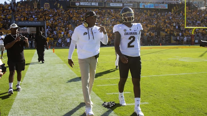 Oct 7, 2023; Tempe, Arizona, USA; Colorado Buffaloes head coach Deion Sanders with son and