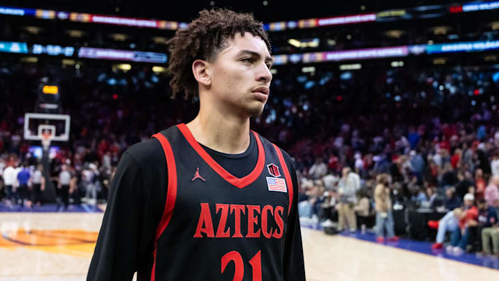 Dec 20, 2025; Phoenix, Arizona, USA; San Diego State Aztecs guard Miles Byrd (21) against the Arizona Wildcats during the Hall of Fame Series at Mortgage Matchup Center. Mandatory Credit: Mark J. Rebilas-Imagn Images