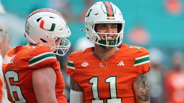 Sep 6, 2025; Miami Gardens, Florida, USA; Miami Hurricanes quarterback Carson Beck (11) reacts on the field before the game against the Bethune-Cookman Wildcats at Hard Rock Stadium. Mandatory Credit: Sam Navarro-Imagn Images