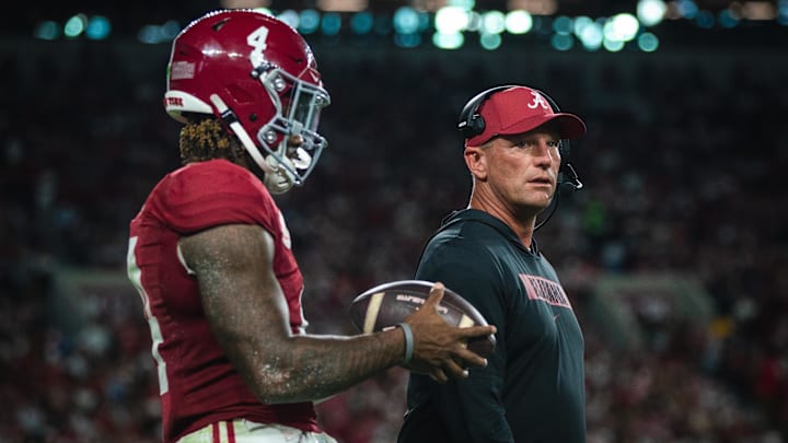Sep 28, 2024; Tuscaloosa, Alabama, USA; Alabama Crimson Tide quarterback Jalen Milroe (4) and head coach Kalen DeBoer