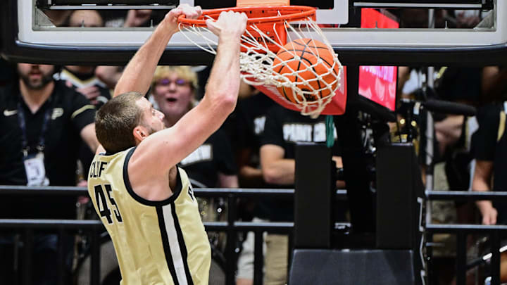 Purdue Boilermakers center Oscar Cluff (45) dunks the ball Purdue Boilermakers center Oscar Cluff (45) dunks the ball