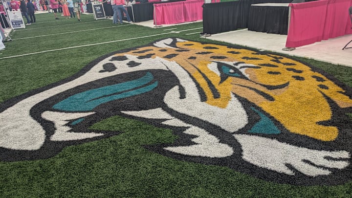 Donna Marathon Expo booths surround the Jacksonville Jaguars logo inside the Daily's Place flex field on Jan. 31, 2025. [Clayton Freeman/Florida Times-Union]