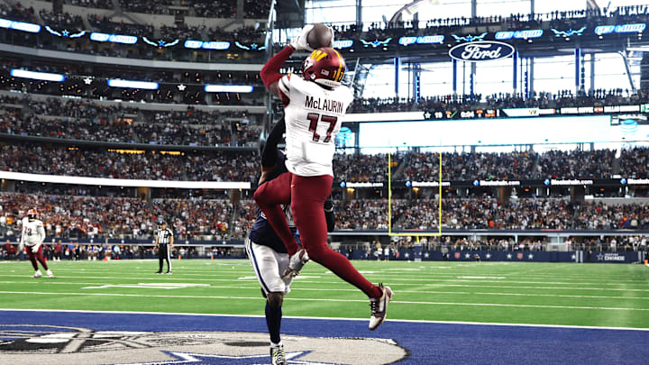 Jan 5, 2025; Arlington, Texas, USA; Washington Commanders wide receiver Terry McLaurin (17) catches the game winning touchdown against Dallas Cowboys cornerback DaRon Bland (26) during the fourth quarter at AT&T Stadium. Mandatory Credit: Tim Heitman-Imagn Images