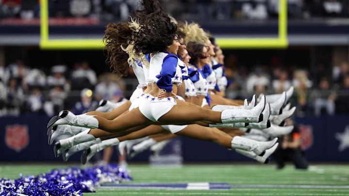 The Dallas Cowboys Cheerleaders perform during the first quarter for the 2024 NFC wild card game against the Green Bay Packers at AT&T Stadium.