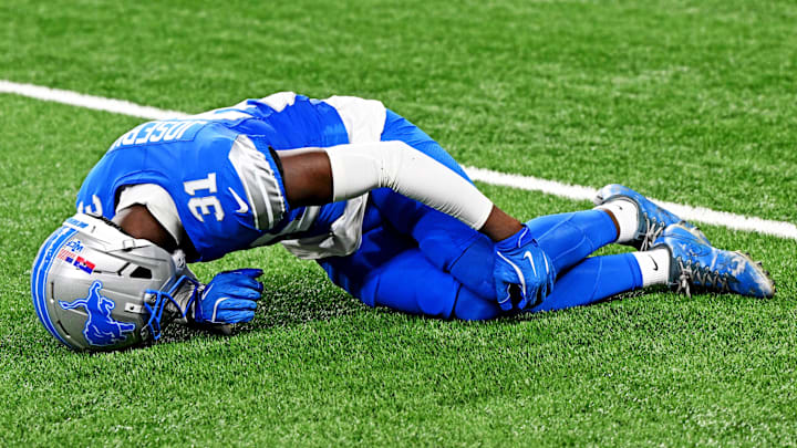 Sep 28, 2025; Detroit, Michigan, USA; Detroit Lions safety Kerby Joseph (31) holds his knee after an injury during the first half against the Cleveland Browns at Ford Field. Mandatory Credit: Lon Horwedel-Imagn Images