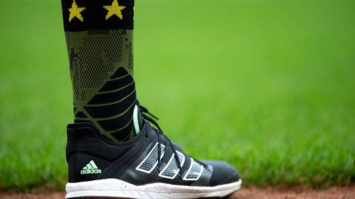 Cincinnati Reds right fielder Nick Castellanos (2) stands during the national anthem with special