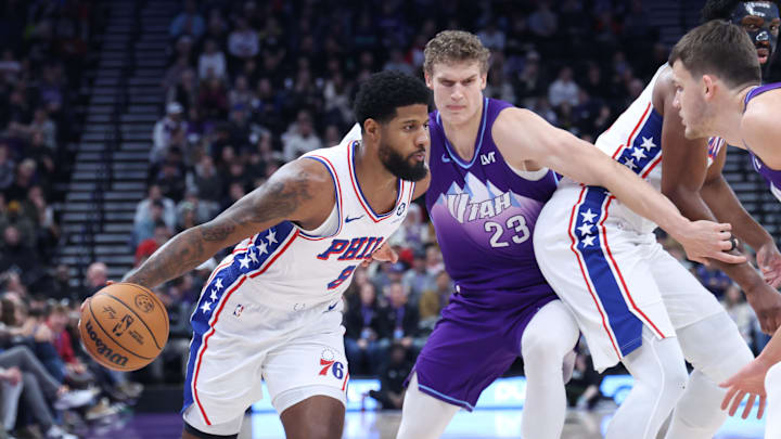 Dec 28, 2024; Salt Lake City, Utah, USA; Philadelphia 76ers forward Paul George (8) dribbles against Utah Jazz forward Lauri Markkanen (23) during the first quarter at Delta Center. Mandatory Credit: Rob Gray-Imagn Images Dec 28, 2024; Salt Lake City, Utah, USA; Philadelphia 76ers forward Paul George (8) dribbles against Utah Jazz forward Lauri Markkanen (23) during the first quarter at Delta Center. Mandatory Credit: Rob Gray-Imagn Images