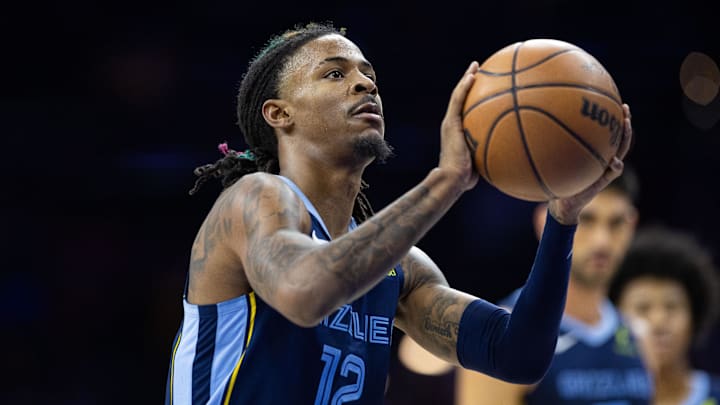 Nov 2, 2024; Philadelphia, Pennsylvania, USA; Memphis Grizzlies guard Ja Morant (12) shoots a foul shot against the Philadelphia 76ers during the fourth quarter at Wells Fargo Center. Mandatory Credit: Bill Streicher-Imagn Images