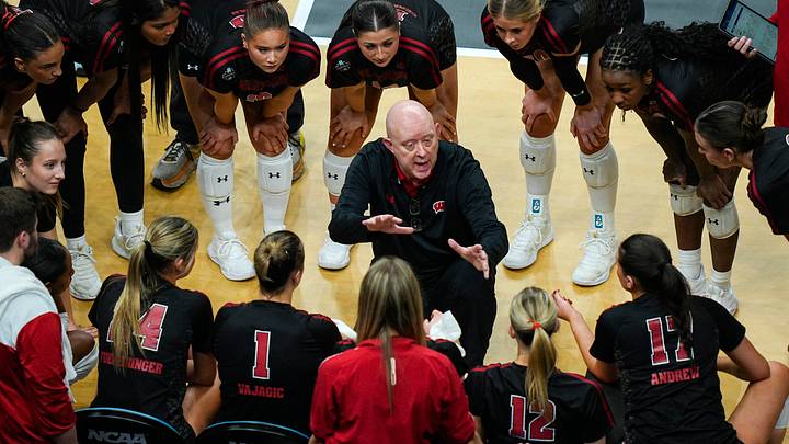 Dec 18, 2025; Kansas City, MO, USA; Wisconsin Badgers head coach Kelly Sheffield talks to his players during a timeout in the third set against the Kentucky Wildcats in a 2025 NCAA Women’s Volleyball Championship semifinal match at T-Mobile Center. Mandatory Credit: Jay Biggerstaff-Imagn Images