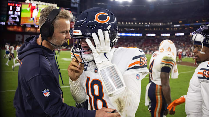 Bears quarterback Caleb Williams (18) reacts with head coach Matt Eberflus in 2024.