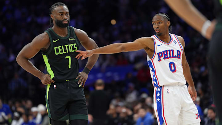 Feb 2, 2025; Philadelphia, Pennsylvania, USA; Philadelphia 76ers guard Tyrese Maxey (0) gestures to Boston Celtics forward Jaylen Brown (7) in the second quarter at Wells Fargo Center. Mandatory Credit: Kyle Ross-Imagn Images
