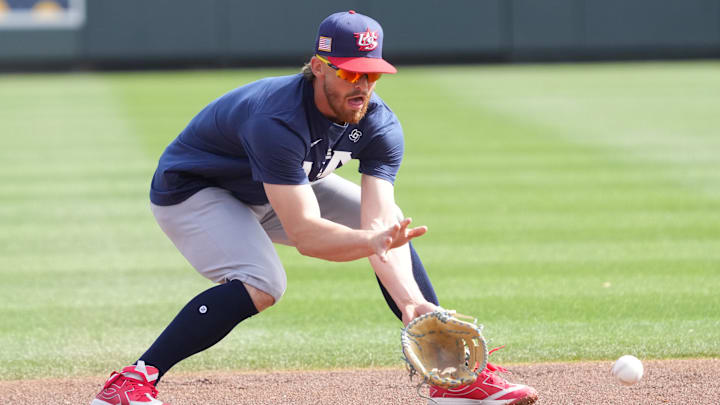 Mar 4, 2026; Scottsdale, AZ, USA; United States shortstop Bobby Witt Jr. (7) warms up before a game against the Colorado Rockies at Salt River Fields. Mandatory Credit: Rick Scuteri-Imagn Images