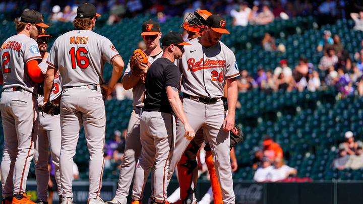 Sep 2, 2026; Denver, Colorado, USA;  Baltimore Orioles manager Craig Albernaz (55) pulls starting pitcher Trevor Rogers (28) in the seventh inning against the Colorado Rockies at Coors Field.  Mandatory Credit: Ron Chenoy-Imagn Images