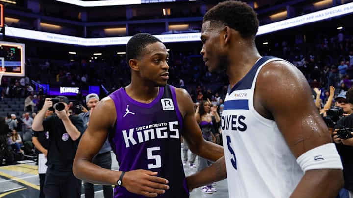 Nov 15, 2024; Sacramento, California, USA; Sacramento Kings guard De'Aaron Fox (5) and Minnesota Timberwolves guard Anthony Edwards (5) meet after the game at Golden 1 Center. Nov 15, 2024; Sacramento, California, USA; Sacramento Kings guard De'Aaron Fox (5) and Minnesota Timberwolves guard Anthony Edwards (5) meet after the game at Golden 1 Center.