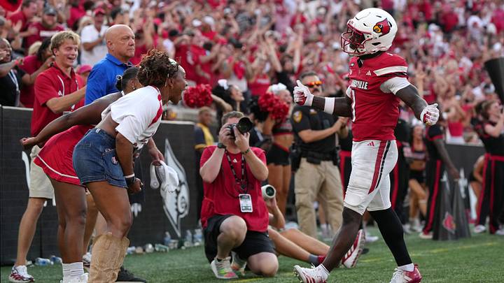 Sep 19, 2026; Louisville, Kentucky, USA; Louisville Cardinals running back Isaac Brown (1) celebrates after scoring a touchdown against the Southern Methodist Mustangs during the fourth quarter at L&N Federal Credit Union Stadium. Mandatory Credit: Chris Carter-Imagn Images Sep 19, 2026; Louisville, Kentucky, USA; Louisville Cardinals running back Isaac Brown (1) celebrates after scoring a touchdown against the Southern Methodist Mustangs during the fourth quarter at L&N Federal Credit Union Stadium. Mandatory Credit: Chris Carter-Imagn Images