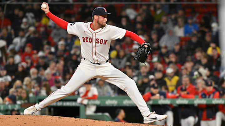 Boston, Massachusetts, USA; Boston Red Sox relief pitcher Cooper Criswell (64) pitches against the St. Louis Cardinals during the seventh inning at Fenway Park.