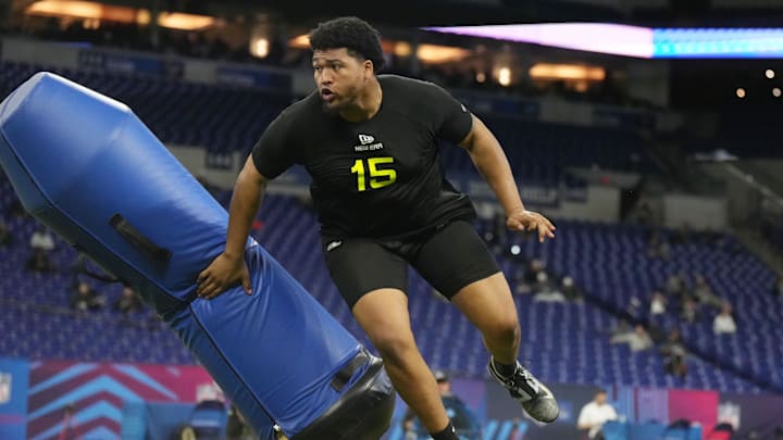 Feb 27, 2025; Indianapolis, IN, USA; Oregon defensive lineman Derrick Harmon (DL15) participates in drills during the 2025 NFL Combine at Lucas Oil Stadium. Mandatory Credit: Kirby Lee-Imagn Images