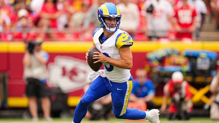 Aug 15, 2026; Kansas City, Missouri, USA; Los Angeles Rams quarterback Stetson Bennett IV (13) rolls out to pass during the first half against the Kansas City Chiefs at at Arrowhead Stadium. Mandatory Credit: Jay Biggerstaff-Imagn Images Aug 15, 2026; Kansas City, Missouri, USA; Los Angeles Rams quarterback Stetson Bennett IV (13) rolls out to pass during the first half against the Kansas City Chiefs at at Arrowhead Stadium. Mandatory Credit: Jay Biggerstaff-Imagn Images