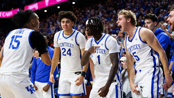 Dec 13, 2025; Lexington, Kentucky, USA; Kentucky Wildcats guard Collin Chandler (5), guard Denzel Aberdeen (1) and center Malachi Moreno (24) celebrate with guard Jaland Lowe (15) after he scores a basket during the second half against the Indiana Hoosiers at Rupp Arena at Central Bank Center. Mandatory Credit: Jordan Prather-Imagn Images Dec 13, 2025; Lexington, Kentucky, USA; Kentucky Wildcats guard Collin Chandler (5), guard Denzel Aberdeen (1) and center Malachi Moreno (24) celebrate with guard Jaland Lowe (15) after he scores a basket during the second half against the Indiana Hoosiers at Rupp Arena at Central Bank Center. Mandatory Credit: Jordan Prather-Imagn Images
