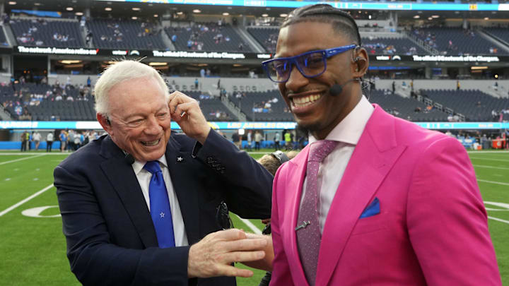 Oct 16, 2023; Inglewood, California, USA; Dallas Cowboys owner Jerry Jones (left) talks with Robert Griffin III at SoFi Stadium.