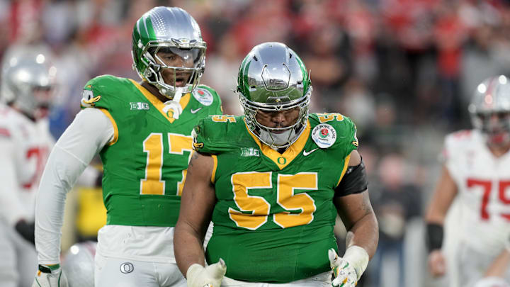 Jan 1, 2025; Pasadena, CA, USA; Oregon Ducks defensive lineman Derrick Harmon (55) reacts in the second half against the Ohio State Buckeyes in the 2025 Rose Bowl college football quarterfinal game at Rose Bowl Stadium. Mandatory Credit: Kirby Lee-Imagn Images Jan 1, 2025; Pasadena, CA, USA; Oregon Ducks defensive lineman Derrick Harmon (55) reacts in the second half against the Ohio State Buckeyes in the 2025 Rose Bowl college football quarterfinal game at Rose Bowl Stadium. Mandatory Credit: Kirby Lee-Imagn Images