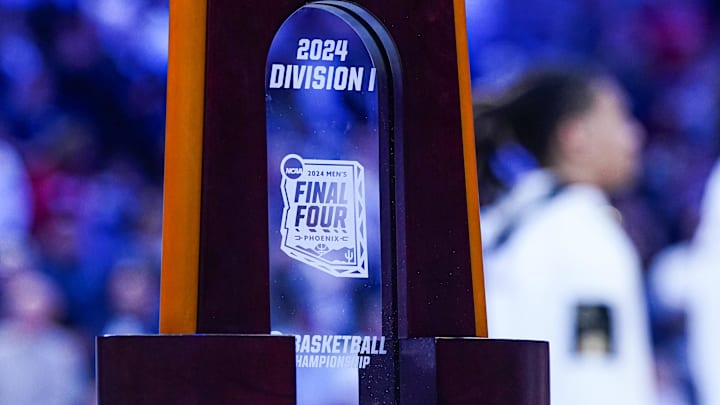Nov 6, 2024; Storrs, Connecticut, USA; The Connecticut Huskies NCAA Final Four Championship trophy is displayed on the court before the start of the game against the Sacred Heart Pioneers at Harry A. Gampel Pavilion. Mandatory Credit: David Butler II-Imagn Images