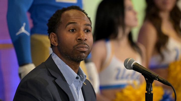 Feb 13, 2024; Los Angeles, CA, USA; UCLA Bruins athletic director Martin Jarmond listens as DeShaun Foster speaks to media after he was introduced as the new head football coach during a press conference at Pauley Pavilion. Mandatory Credit: Jayne Kamin-Oncea-Imagn Images Feb 13, 2024; Los Angeles, CA, USA; UCLA Bruins athletic director Martin Jarmond listens as DeShaun Foster speaks to media after he was introduced as the new head football coach during a press conference at Pauley Pavilion. Mandatory Credit: Jayne Kamin-Oncea-Imagn Images