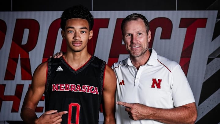 Quentin Rhymes with coach Fred Hoiberg on his visit to Lincoln as a high school prospect. Quentin Rhymes with coach Fred Hoiberg on his visit to Lincoln as a high school prospect.