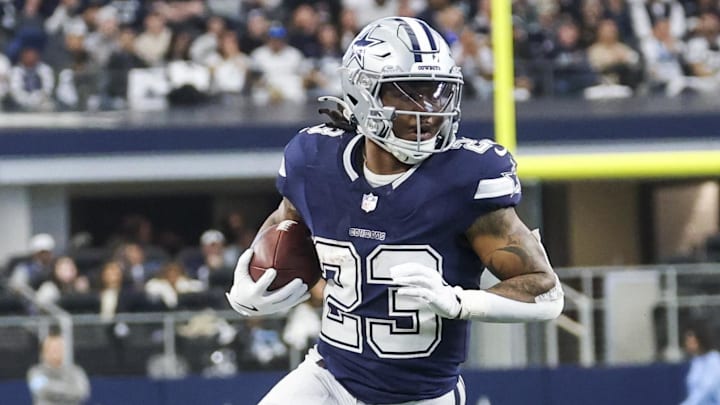 Jan 5, 2025; Arlington, Texas, USA; Dallas Cowboys running back Rico Dowdle (23) runs with the ball during the game against the Washington Commanders at AT&T Stadium. Mandatory Credit: Kevin Jairaj-Imagn Images Jan 5, 2025; Arlington, Texas, USA; Dallas Cowboys running back Rico Dowdle (23) runs with the ball during the game against the Washington Commanders at AT&T Stadium. Mandatory Credit: Kevin Jairaj-Imagn Images
