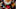 Overhead of pumpkin spice latte on plaid fall scarf with leaves Overhead of pumpkin spice latte on plaid fall scarf with leaves