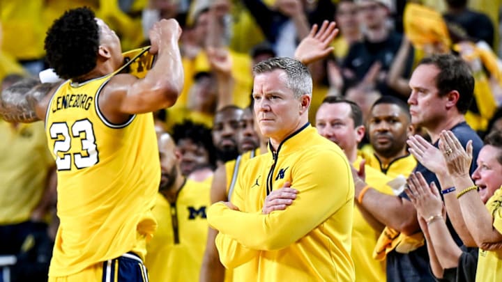 Michigan's head coach Dusty May looks on as Yaxel Lendeborg, left, celebrates during the second half in the game against Michigan State on Sunday, March 8, 2026, at the Crisler Center in Ann Arbor. Michigan's head coach Dusty May looks on as Yaxel Lendeborg, left, celebrates during the second half in the game against Michigan State on Sunday, March 8, 2026, at the Crisler Center in Ann Arbor.