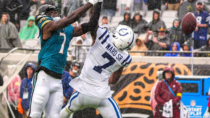 Jacksonville Jaguars wide receiver Brian Thomas Jr. (7) can’t hold onto a pass intended for him in the third quarter as Indianapolis Colts cornerback Charvarius Ward (7) defends him during an NFL football game at EverBank Stadium, Sunday, Dec. 7, 2025, in Jacksonville, Fla. Jaguars won 36-19[Doug Engle/Florida Times-Union]