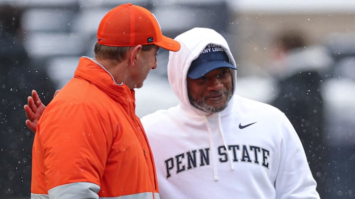 Clemson Tigers head coach Dabo Swinney, left, talks with Penn State Nittany Lions interim head coach Terry Smith