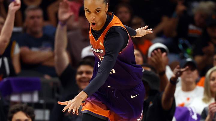 Aug 7, 2025; Phoenix, Arizona, USA; Phoenix Mercury forward DeWanna Bonner (14) celebrates a play against the Indiana Fever during WNBA game at PHX Arena. Mandatory Credit: Mark J. Rebilas-Imagn Images