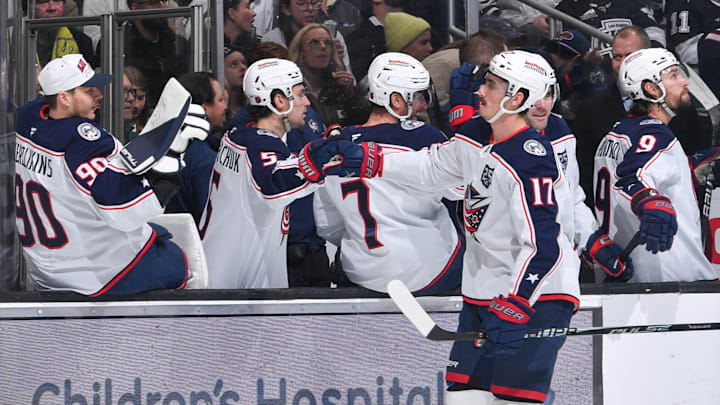 Blue Jackets winger Mason Marchment celebrates a goal with his teammates. 